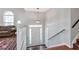 Bright entryway with staircase, hardwood floors, and natural light at 239 Taylors Farm Drive Dr, Canton, GA 30115