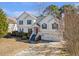 Charming two-story home featuring a well-maintained yard and a two-car garage, perfect for suburban living at 239 Taylors Farm Drive Dr, Canton, GA 30115