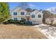 Charming two-story home with a well-manicured front yard and a two-car garage in a residential neighborhood at 239 Taylors Farm Drive Dr, Canton, GA 30115