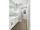Stylish bathroom with a double sink vanity, tile floors, and a glass shower at 244 Coastline Road Rd, Fayetteville, GA 30214