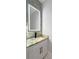 Modern powder room with granite countertop vanity, stone accent wall, LED mirror and modern faucet at 244 Coastline Road Rd, Fayetteville, GA 30214