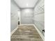 Walk-in closet with custom shelving and storage solutions for optimal organization at 244 Coastline Road Rd, Fayetteville, GA 30214