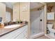 Bathroom with vanity and shower, offering a modern design at 220 Renaissance Ne Pkwy # 1115, Atlanta, GA 30308