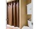 Bathroom featuring a shower with a brown curtain at 220 Renaissance Ne Pkwy # 1115, Atlanta, GA 30308