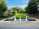 Beautiful water fountain surrounded by lush greenery and manicured landscape at 220 Renaissance Ne Pkwy # 1115, Atlanta, GA 30308