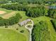 Expansive estate features a luxurious home, circular driveway, and lush green surroundings at 226 Euharlee Five Forks Rd, Kingston, GA 30145