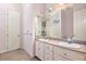 Bathroom with double sinks, granite countertop, and white cabinets at 226 Euharlee Five Forks Rd, Kingston, GA 30145