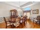 Elegant dining room with hardwood floors, chandelier, and large window, perfect for Gathering gatherings and entertaining at 226 Euharlee Five Forks Rd, Kingston, GA 30145