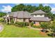 Elegant brick home with manicured landscaping and architectural details at 226 Euharlee Five Forks Rd, Kingston, GA 30145