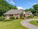 Lovely, traditionally styled brick home with covered front porch and beautifully manicured lawn at 226 Euharlee Five Forks Rd, Kingston, GA 30145