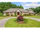 Stunning brick home features circular driveway and meticulously manicured landscaping at 226 Euharlee Five Forks Rd, Kingston, GA 30145