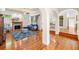 Spacious living room with hardwood floors, fireplace, and comfortable seating, ideal for relaxation and entertainment at 226 Euharlee Five Forks Rd, Kingston, GA 30145