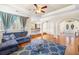 Inviting living room with hardwood floors, archways, and comfortable seating, creating a welcoming atmosphere at 226 Euharlee Five Forks Rd, Kingston, GA 30145