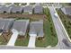 Aerial view of a neighborhood with well-maintained homes, manicured lawns, and inviting streets at 242 Aspen Way, Dallas, GA 30157