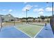 Well-maintained tennis and pickleball courts create a pleasant recreation area at 242 Aspen Way, Dallas, GA 30157