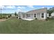Manicured backyard offers a serene outdoor setting at 242 Aspen Way, Dallas, GA 30157