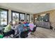 Relaxing common area featuring residents around a table with nice decor and lots of light at 242 Aspen Way, Dallas, GA 30157