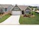Charming single-story home with a well-manicured lawn, a two-car garage, and inviting curb appeal at 242 Aspen Way, Dallas, GA 30157
