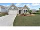 Charming single Gathering home with a well-manicured lawn and a two-car garage, perfect for suburban living at 242 Aspen Way, Dallas, GA 30157