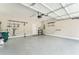 Epoxy-coated garage with work and storage area at 242 Aspen Way, Dallas, GA 30157