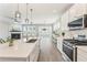 Spacious kitchen featuring stainless steel appliances and modern cabinetry at 242 Aspen Way, Dallas, GA 30157