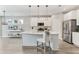 Bright kitchen with stainless steel appliances, island and open layout at 242 Aspen Way, Dallas, GA 30157