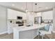 Elegant kitchen with stainless steel appliances, island and subway tile backsplash at 242 Aspen Way, Dallas, GA 30157