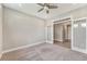 Bright, carpeted office space with glass panel doors and neutral color palette at 242 Aspen Way, Dallas, GA 30157