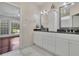 Bathroom features marble floors, granite countertops and a dual sink vanity at 314 Santa Anita Ave, Woodstock, GA 30189