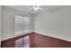 Bedroom with ceiling fan, natural light and gleaming hardwood floors at 314 Santa Anita Ave, Woodstock, GA 30189