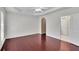 Bright bedroom features hardwood floors, ceiling fan, and ensuite bath access at 314 Santa Anita Ave, Woodstock, GA 30189