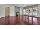 Spacious living room featuring hardwood floors, a fireplace, and an abundance of natural light at 314 Santa Anita Ave, Woodstock, GA 30189