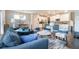 Stylish open-concept living area with hardwood floors seamlessly connected to a modern kitchen and dining space at 4406 Richmond Court Ct, Stone Mountain, GA 30083