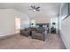 Spacious main bedroom featuring neutral carpet, ample natural light, and comfortable seating area, creating a serene retreat at 4406 Richmond Court Ct, Stone Mountain, GA 30083