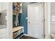 Stylish mud room featuring a built-in bench with storage, shelving, and a convenient coat rack at 4406 Richmond Court Ct, Stone Mountain, GA 30083