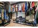 Spacious walk-in closet with custom shelving and ample storage for clothes and shoes at 4406 Richmond Court Ct, Stone Mountain, GA 30083