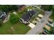 Aerial view of townhomes, showing street access, parking, and landscaping for the complex at 924 Park Gate Pl, Stone Mountain, GA 30083