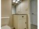 Bathroom with vanity sink, mirror, and modern lighting at 924 Park Gate Pl, Stone Mountain, GA 30083