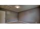 Bedroom with neutral walls, carpet, a window, and one door at 924 Park Gate Pl, Stone Mountain, GA 30083