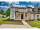 Charming home with a stone-accented porch and sidewalk leading to the front door at 924 Park Gate Pl, Stone Mountain, GA 30083