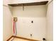Unfinished laundry room with hookups and a shelf at 924 Park Gate Pl, Stone Mountain, GA 30083