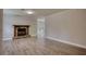 Bright living room showcasing new floors and a stone fireplace, great for entertaining guests at 924 Park Gate Pl, Stone Mountain, GA 30083