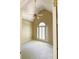 Carpeted bedroom with vaulted ceiling, fan, and window with decorative shutters at 1245 Mclendon Dr, Decatur, GA 30033