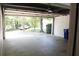 Spacious two-car garage with automatic door and room for storage and access to the backyard at 1245 Mclendon Dr, Decatur, GA 30033