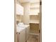 Functional laundry room with washer, dryer, storage cabinets, and tile flooring at 1245 Mclendon Dr, Decatur, GA 30033