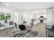 Bright dining room with modern table and chairs near kitchen at 2160 Perkerson Sw Rd, Atlanta, GA 30315