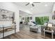 Open floor plan with a modern living room featuring backyard views at 2160 Perkerson Sw Rd, Atlanta, GA 30315