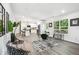 Open floor plan with a modern living space with a dining area and a kitchen at 2160 Perkerson Sw Rd, Atlanta, GA 30315