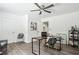 The bright office has stylish decor, a ceiling fan, and open door at 2160 Perkerson Sw Rd, Atlanta, GA 30315