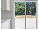 A close up of a sliding glass door provides access to the backyard area at 2601 Garland Way, Duluth, GA 30096